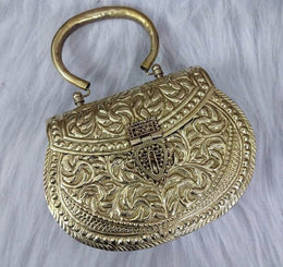 Round edge golden box clutch with carving