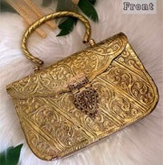 Round edge golden box clutch with carving