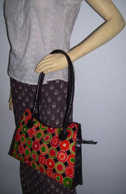 CIRCLE EMBOSS  ROUND CUT LEATHER BAG