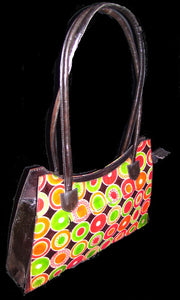 CIRCLE EMBOSS  ROUND CUT LEATHER BAG