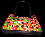 CIRCLE EMBOSS  ROUND CUT LEATHER BAG