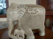 WOODEN ELEPHANT CHILD & TREE IN TRUNK