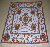 EMBROIDERED CUSHION COVER