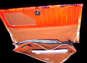 EMBOSS MOTIF LEATHER CLUTCH BAG