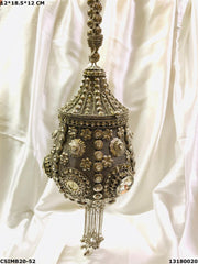 Round clutch bag in perforated-patterned