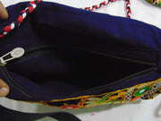 TASSEL CLUTCH BAG