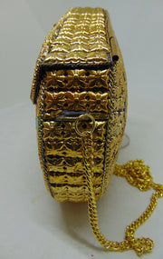 Eye pattern Golden brass motif mosaic metal clutch