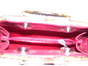 Golden bead clutch purse