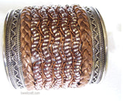 METAL CUFF WITH LEATHER CORD