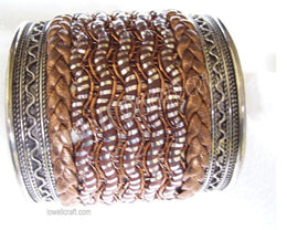 METAL CUFF WITH LEATHER CORD