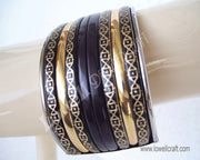METAL WRIST CUFF WITH LEATHER CORD